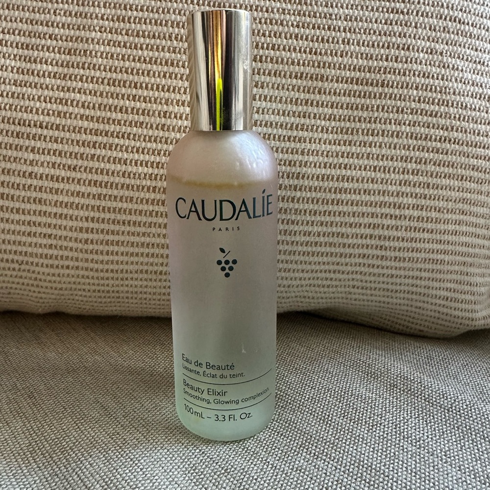 Caudalie Beauty Elixir Toner in Frosted Green Bottle with Silver Cap